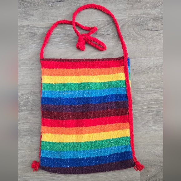 Handbags - Woven rainbow satchel with a red strap and trim.